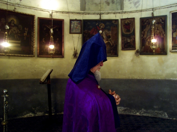 Armenian Bishop at the Church of the Nativity in Bethlehem (REUTERS) Armenian Bishop at the Church of the Nativity in Bethlehem (REUTERS)