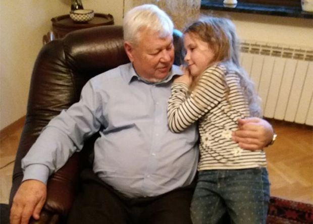 Andrzej Kasprzyk with his granddaughter 