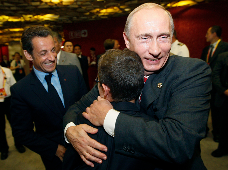 Никола Саркози, его сын Луи и Владимир Путин на Олимпийском стадионе в Пекине