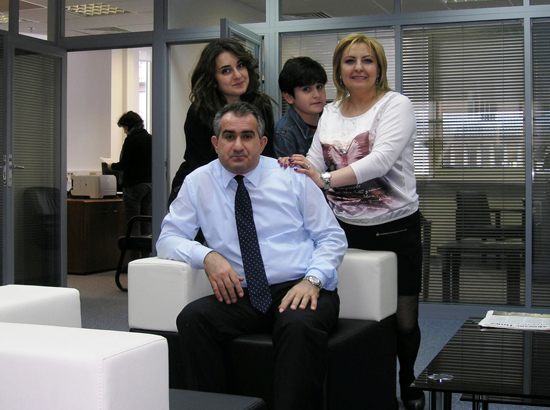 Albert Grigoryan in his GDF SUEZ Moscow office with family 