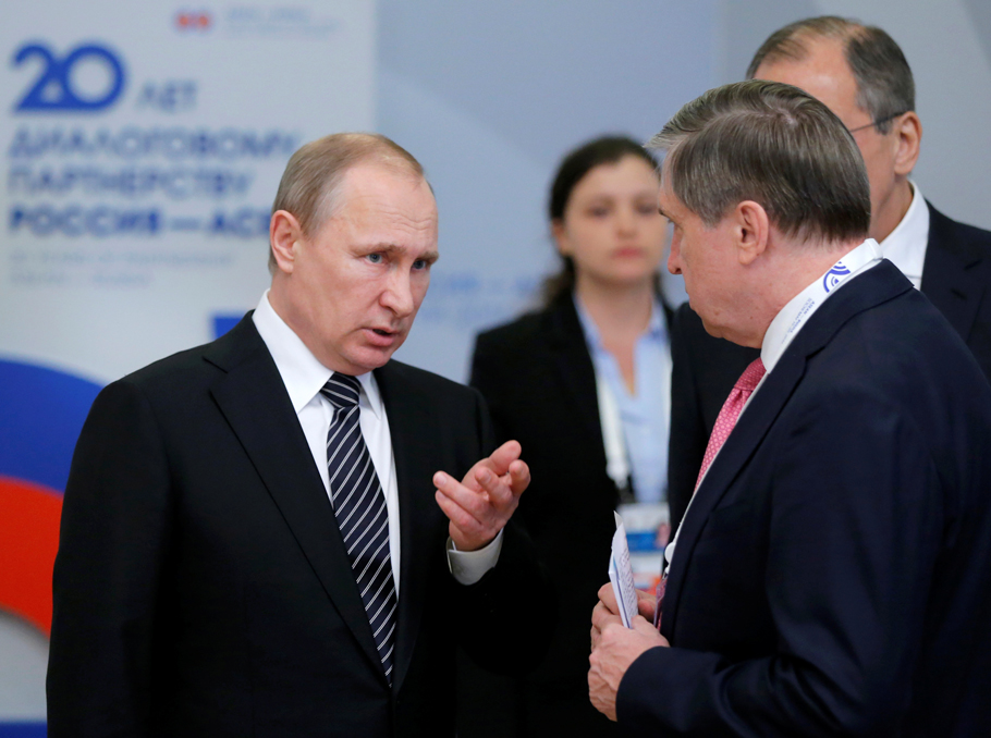 Vladimir Putin and Yuri Ushakov