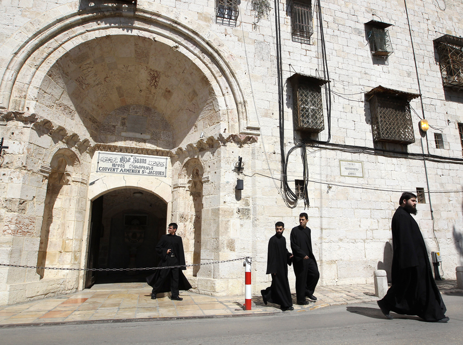 Armenian monks at the Armenian Cathedral of Saint James in Jerusalem (REUTERS)